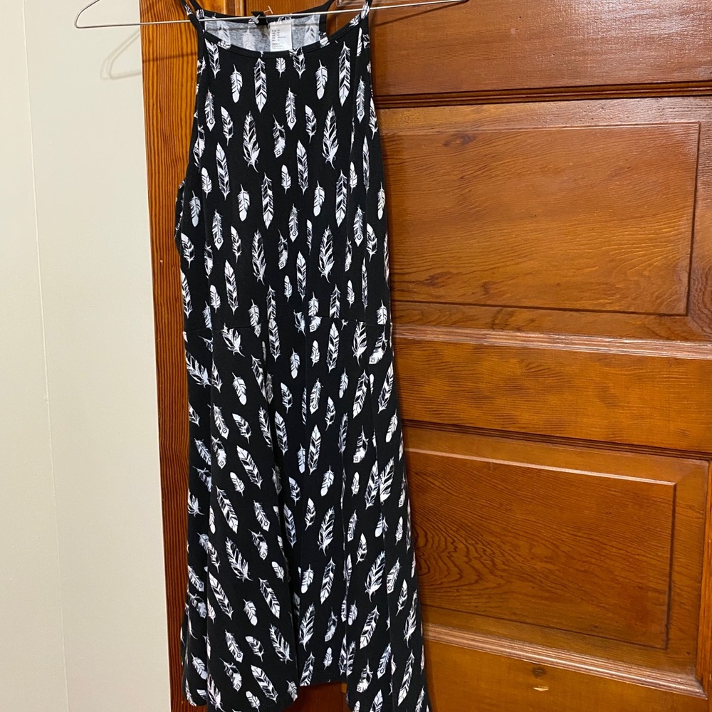 Black dress with feather pattern
